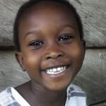 African girl happy and smiling.